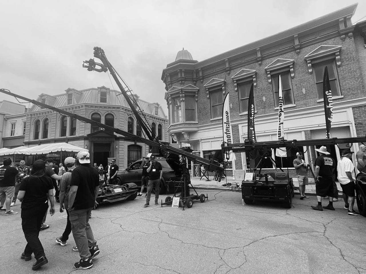 Camera crane crew on a street film set