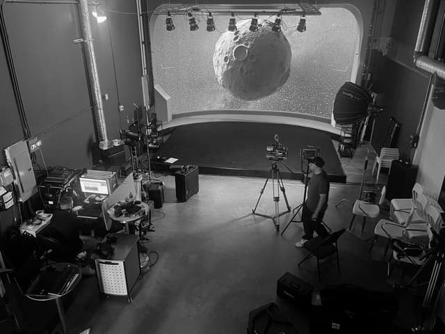 Virtual production stage with a lunar backdrop